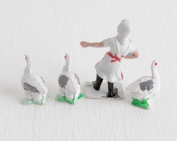 Woman with Three White Geese at Lobster Bisque Vintage
